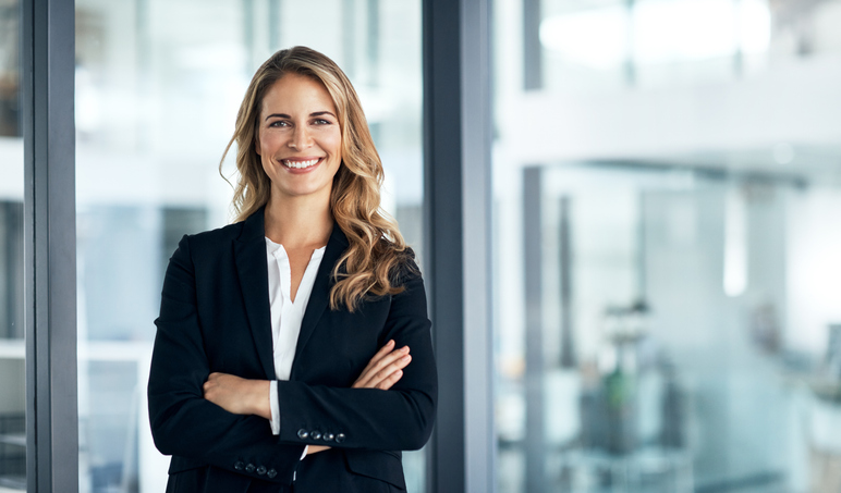 Financial adviser in a modern office presenting Manulife's 139-year operating history and crisis track record to a high-net-worth client
